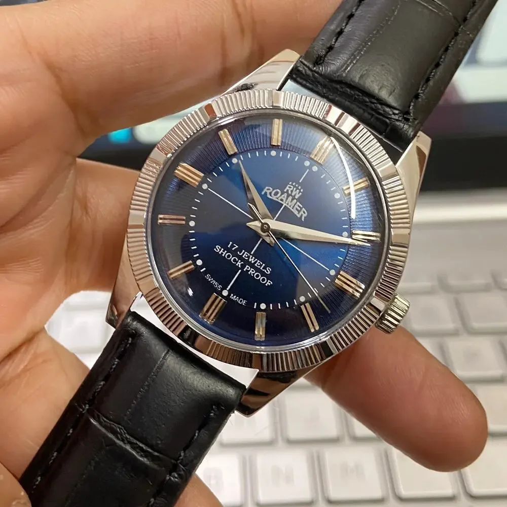 Vintage 1980 Roamer Manual Mens Silver Watch W/Fluted Bezel & Blue accents